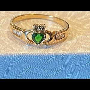 Claddagh ring with emerald and diamonds